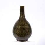 Tea dust bottle vase Chinese, 19th Century decorated with an olive green glaze, 31.5cm high