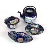 Group of enamel Chinese comprising of a tea bowl and cover, a rectangular tray, a teapot and cover