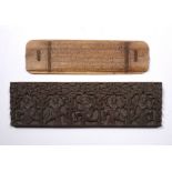 Carved hardwood panel Thai 25cm x 7.5cm and a Burmese astrological chart with Pali script verso,