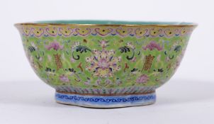 Green enamel decorated bowl Chinese, 19th Century depicting a flowering plants with shou