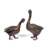 Pair of bronze model geese Japanese, Meiji period the standing birds with neck raised and craning