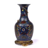 Ceramic vase Chinese decorated to the body depicting two dragons chasing a flaming pearl against a