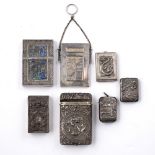 Seven white metal card cases Chinese with a variety of different designs including filigree,