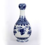 Blue and white vase Chinese, circa 1900 in the Ming style, with flowers painted to the body and a
