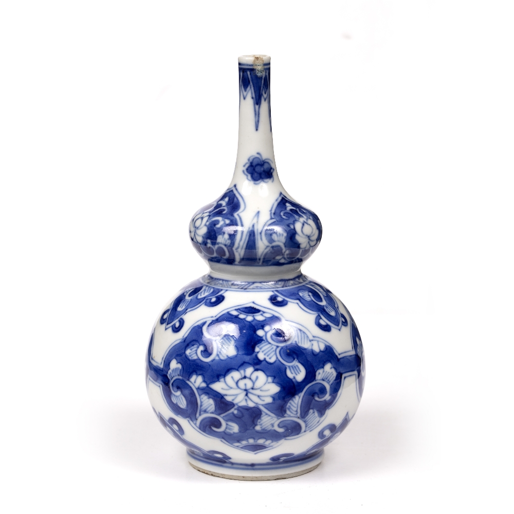 Small blue and white double gourd bottle vase Chinese, Kangxi (1662-1722) with panels of lotus and