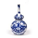 Small blue and white double gourd bottle vase Chinese, Kangxi (1662-1722) with panels of lotus and