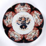 Imari scalloped charger Japanese, late 19th Century with central vase of flowers and panelled