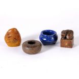 Two brush washers Chinese one made of lapis lazuli, on three squat feet, 2.5cm high, the other