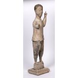 Carved wooden figure Chinese depicted standing, with one arm raised, standing on a raised plinth,