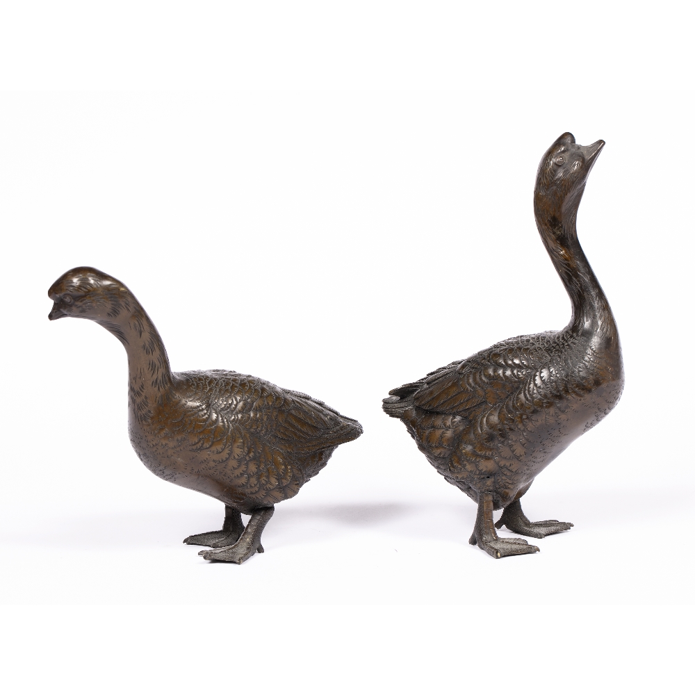 Pair of bronze model geese Japanese, Meiji period the standing birds with neck raised and craning - Image 2 of 2