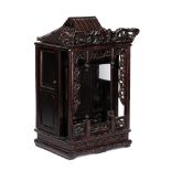 Carved wooden altar cabinet Chinese with pierced decorated sides and a slated rood, with glass front