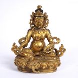 Gilt bronze figure of Amitayus Chinese, 18th Century cast seated on a lotus base, the figure holding