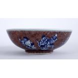 Iron red 'Immortals' bowl Chinese decorated to the sides with eight immortals, the interior