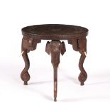 Large carved centre table Indian, circa 1900/1920 with elephant supports, 69cm across, 65cm high