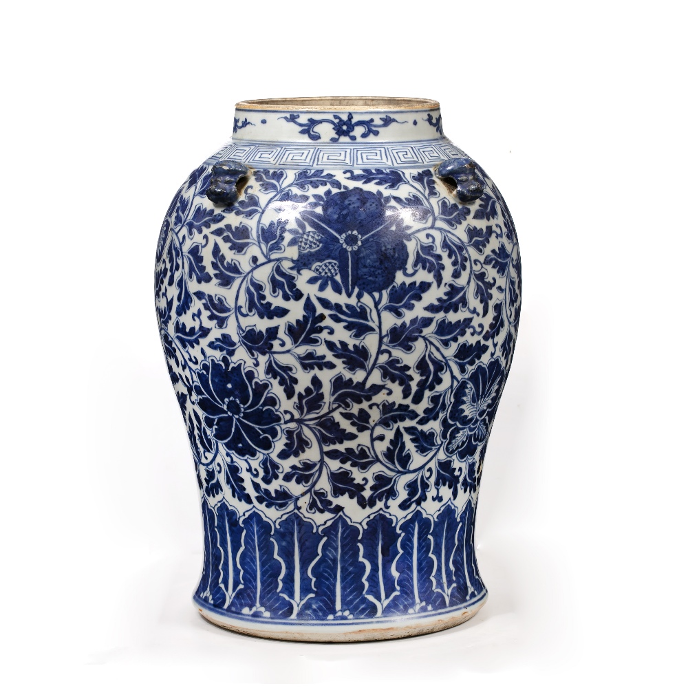 Blue and white vase Chinese, 19th Century decorated to the body in Indian lotus, with four lug