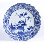 Blue and white Kakiemon style plate Japanese, circa 1700 decorated to the central roundel with a