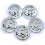 Set of five famille rose plates Chinese, 18th Century each painted with a deer beneath a palm