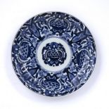 Blue and white dish Japanese, 18th/19th Century decorated to the centre with a floral roundel, the