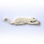 Ivory carved cat Chinese, circa 1900 the recumbent cat pivoted on a wheel, incised with a two