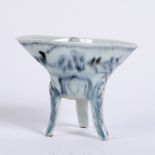 Blue and white porcelain libation cup Chinese, 17th/18th Century the oval cup standing on three