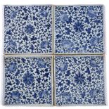 Set of four blue and white porcelain tiles Chinese, 19th Century of square form, painted with