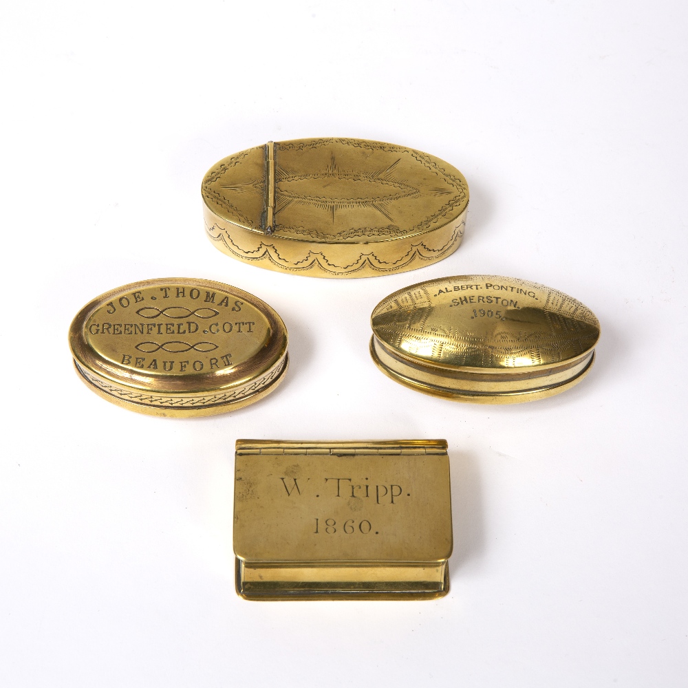 A 19TH CENTURY BRASS SNUFF BOX IN THE FORM OF A BOOK, the cover engraved 'W. Tripp 1860', 6.5cm,