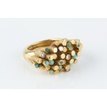 A TURQUOISE AND DIAMOND DRESS RING, modelled as an abstract tubular cluster of part-textured finish,