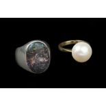 A CULTURED PEARL SINGLE STONE RING, the cultured pearl measuring approximately 13.7mm in diameter,