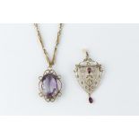 AN AMETHYST PENDANT NECKLACE, the oval mixed-cut amethyst in scrolled pendant mount, suspended