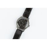 A GENTLEMAN'S WRISTWATCH BY LONGINES, the circular black dial with alternate silvered Arabic