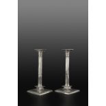 A PAIR OF LATE 18TH/EARLY 19TH CENTURY IRISH SILVER CANDLESTICKS, of fluted column form, with