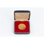 A REPUBLIC OF SINGAPORE GOLD $150 COIN, commemorating the 150th Anniversary of the founding of