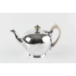 A MID VICTORIAN SILVER GLOBULAR TEAPOT, with engraved decoration, and having ivory handle and