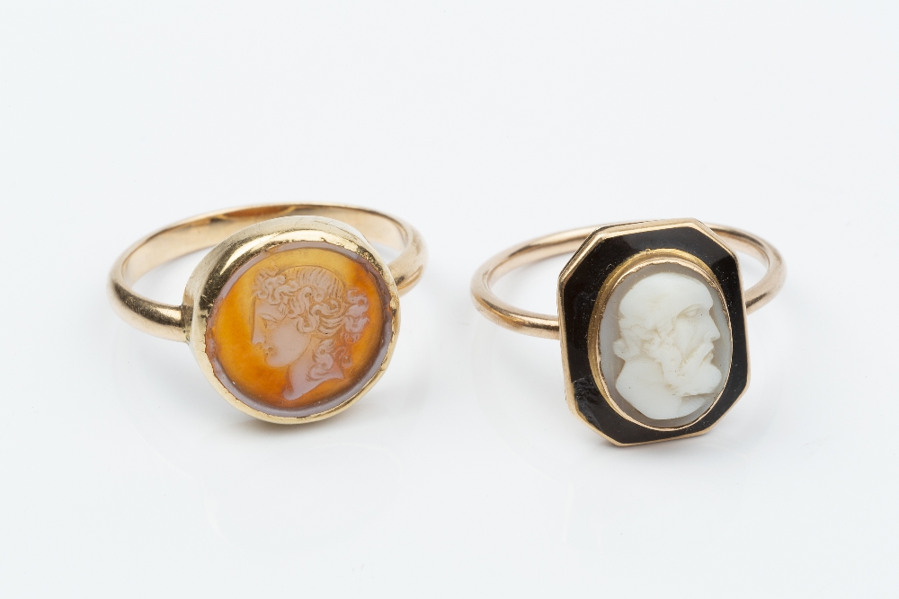 TWO CAMEO RINGS, the first centred with an oval shell cameo, carved to depict a classical male