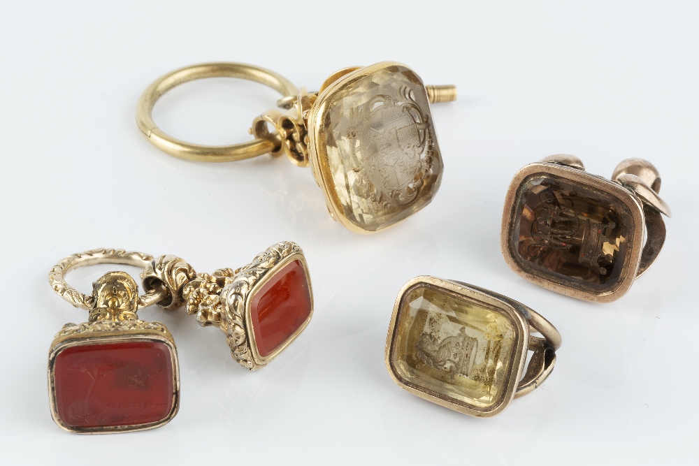 A COLLECTION OF 19TH CENTURY HARDSTONE SEAL FOBS, to include a citrine example, with incised