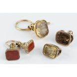 A COLLECTION OF 19TH CENTURY HARDSTONE SEAL FOBS, to include a citrine example, with incised