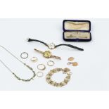 A COLLECTION OF JEWELLERY, comprising a 9ct gold gate-link bracelet, two 9ct gold wedding bands, a