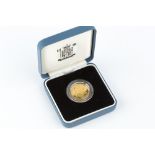 A REPUBLIC OF SOMALIA 9CT GOLD 1000 SCHILLINGS COIN, dated 2002, cased by The Royal Mint