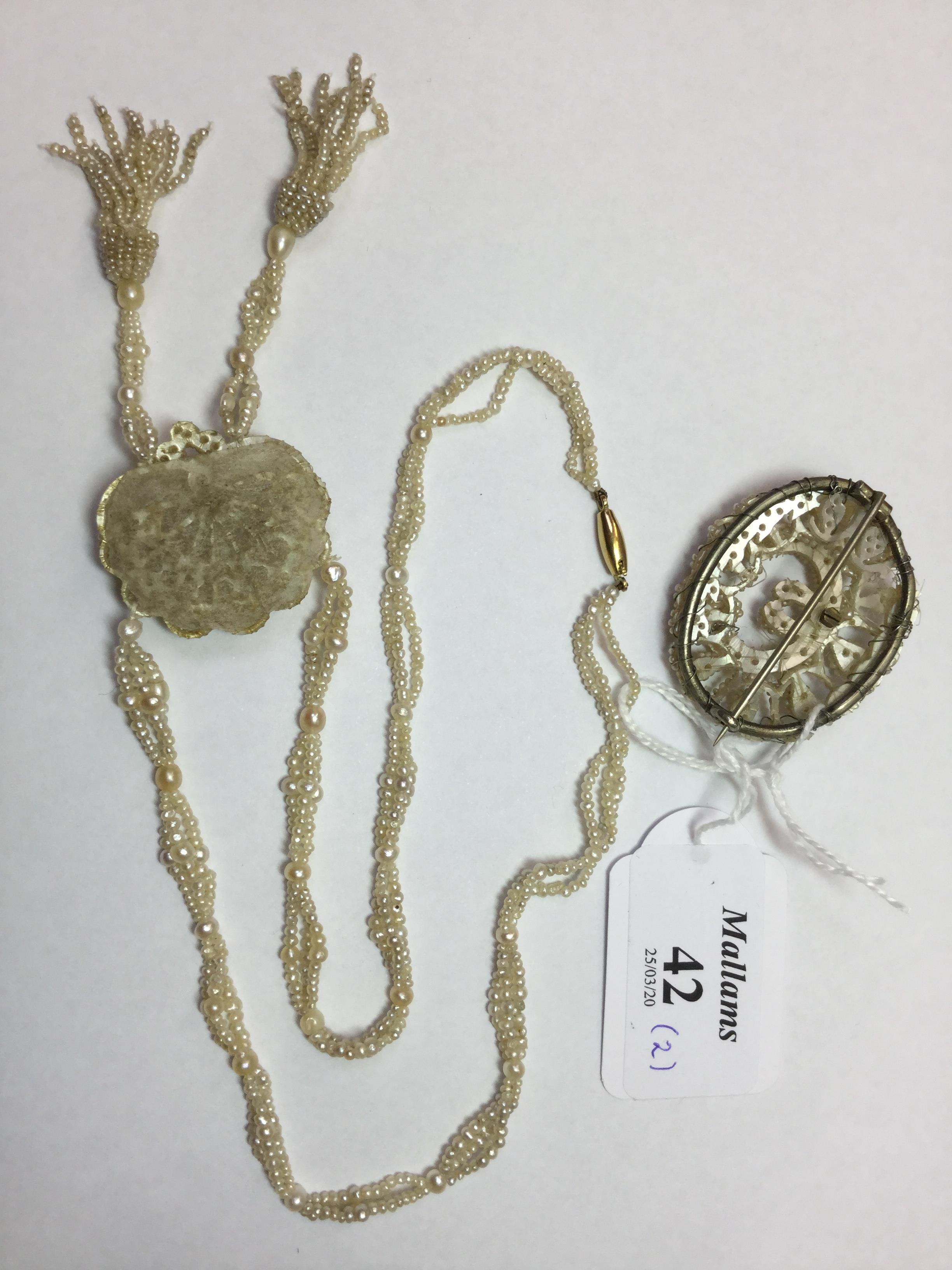 A SEED PEARL PENDANT NECKLACE, the chrysanthemum-shaped panel of graduated seed pearls issuing two - Image 3 of 3