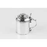 AN EARLY GEORGE III SILVER KITCHEN PEPPER, with domed pierced cover, cylindrical sides and scroll
