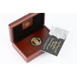 A UNITED STATES OF AMERICA GOLD PROOF HALF-DOLLAR COIN, commemorating the 50th Anniversary of the