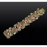 A DIAMOND AND VARI GEM-SET PANEL BRACELET BY ANDREW GRIMA, designed as a series of abstract clusters