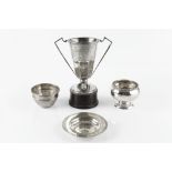 A COLLECTION OF SILVER, comprising a twin handled trophy cup, Birmingham 1933, a small armada