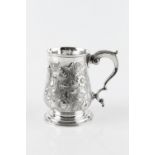 A GEORGE III SILVER BALUSTER MUG, later chased and embossed with flowers and foliage, and with