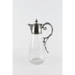 A LATE VICTORIAN CLARET JUG, with silver plated mounts, the tapered glass body engraved with