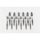 A SET OF TWELVE 20TH CENTURY IRISH SILVER FISH KNIVES AND FORKS, of shaped design, makers initials