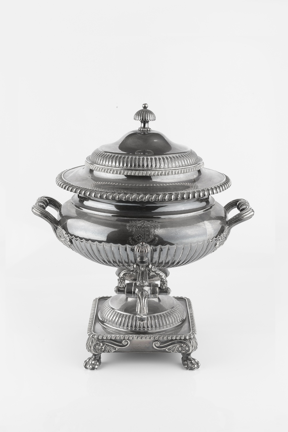 A MID 19TH CENTURY SILVER PLATED BALUSTER TEA URN AND COVER, with gadrooned borders, and twin reeded