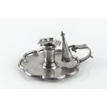 AN EARLY VICTORIAN SILVER CHAMBERSTICK, with lobed borders, and matching snuffer, by Robinson,