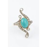 AN EARLY 20TH CENTURY TURQUOISE AND DIAMOND PANEL RING, the central oval cabochon turquoise in