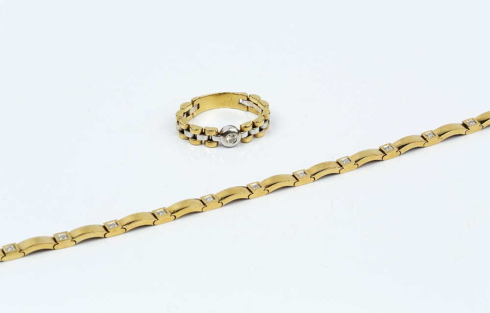 A DIAMOND SET PANEL BRACELET, designed as a line of shaped rectangular panels, spaced by square